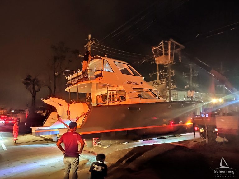 Alaskan 44 Power Catamaran in transport through the night to the Ocean Marina, Pattaya City, Thailand