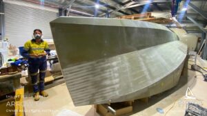 Schionning Designs - Arrow 1360 - 1st 6Months Build Progress - Arrow 1360 Catamaran owner build review located in Perth, Western Australia Demonstrates Schionning Designs detailed multihull kit construction system Shows how experienced owner-builders achieve precise alignment and excellent structural consistency Professional-level results using composite kit construction Six month build progress with hull panels fitted, glassed, and ready for fairing Cabin top constructed first and hoisted into shed roof due to space constraints Main crossing bulkheads joined and reinforcements completed Bulkheads stacked in installation order for efficient workflow MDF build jigs supplied with kit, quick to assemble and accurate Hull jig built in two days with frames aligned to DuFlex panels Forebeam and daggerboards constructed alongside main build Goal to complete bridge deck and hulls by May Bulkhead and bridge deck installation planned for June Exciting and rewarding owner build journey