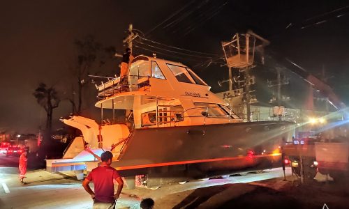 Alaskan 44 Power Catamaran in transport through the night to the Ocean Marina, Pattaya City, Thailand